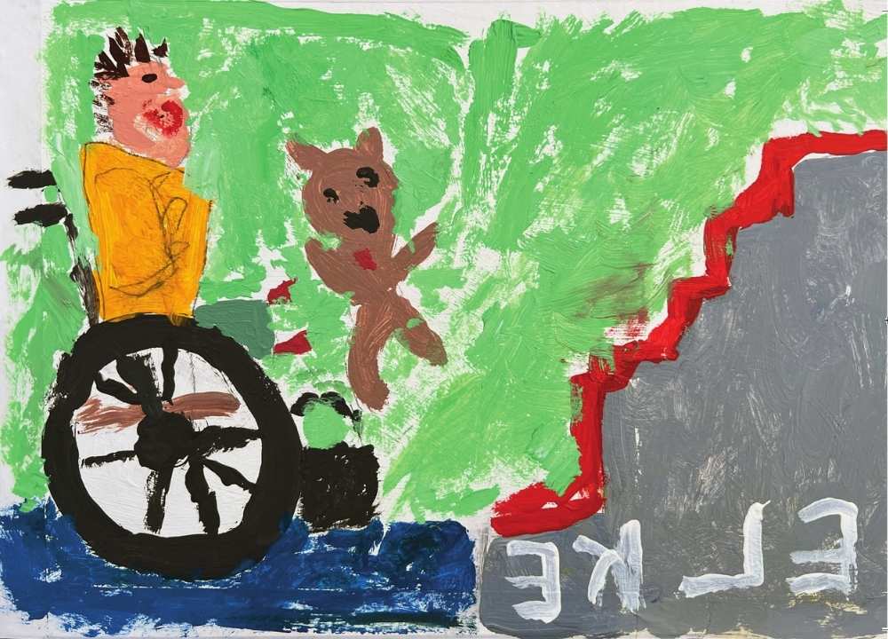 A person wearing yellow clothing sits in a wheelchair in front of a staircase. The steps are depicted in red, which could possibly be blood. A teddy bear flies through the air.